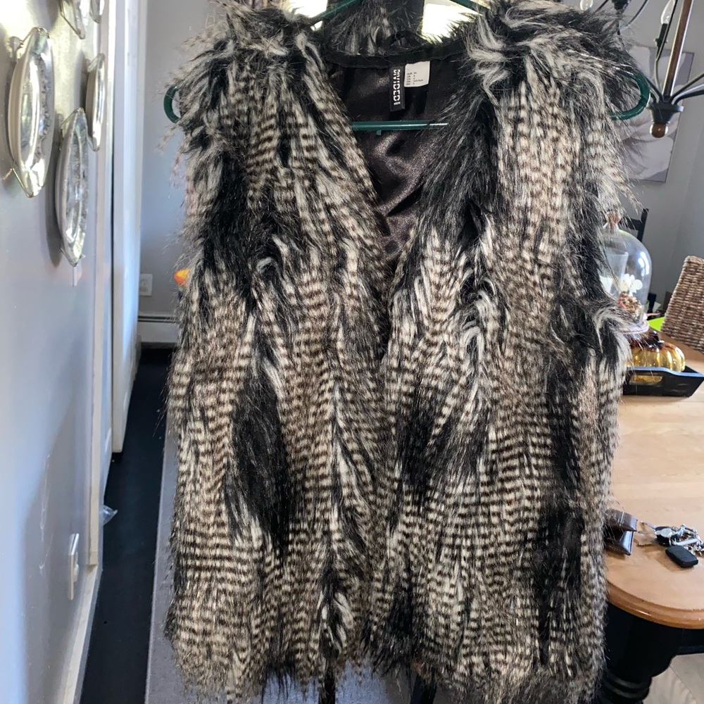 Black and white feathered faux fur vest